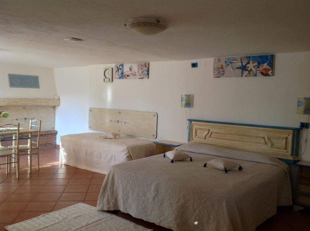 Addisora Appartamenti Cala Liberotto Quarto foto