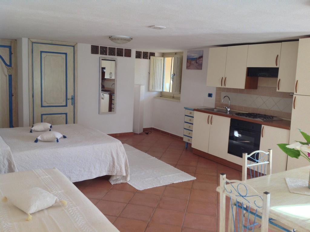 Addisora Appartamenti Cala Liberotto Quarto foto