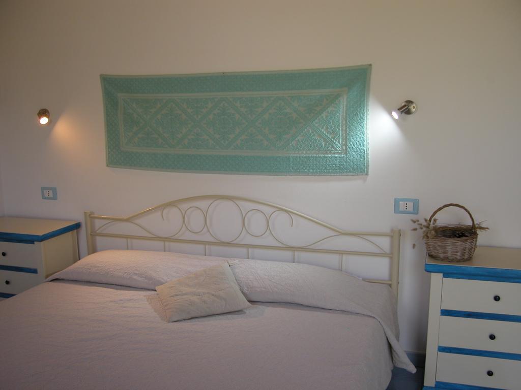 Addisora Appartamenti Cala Liberotto Quarto foto